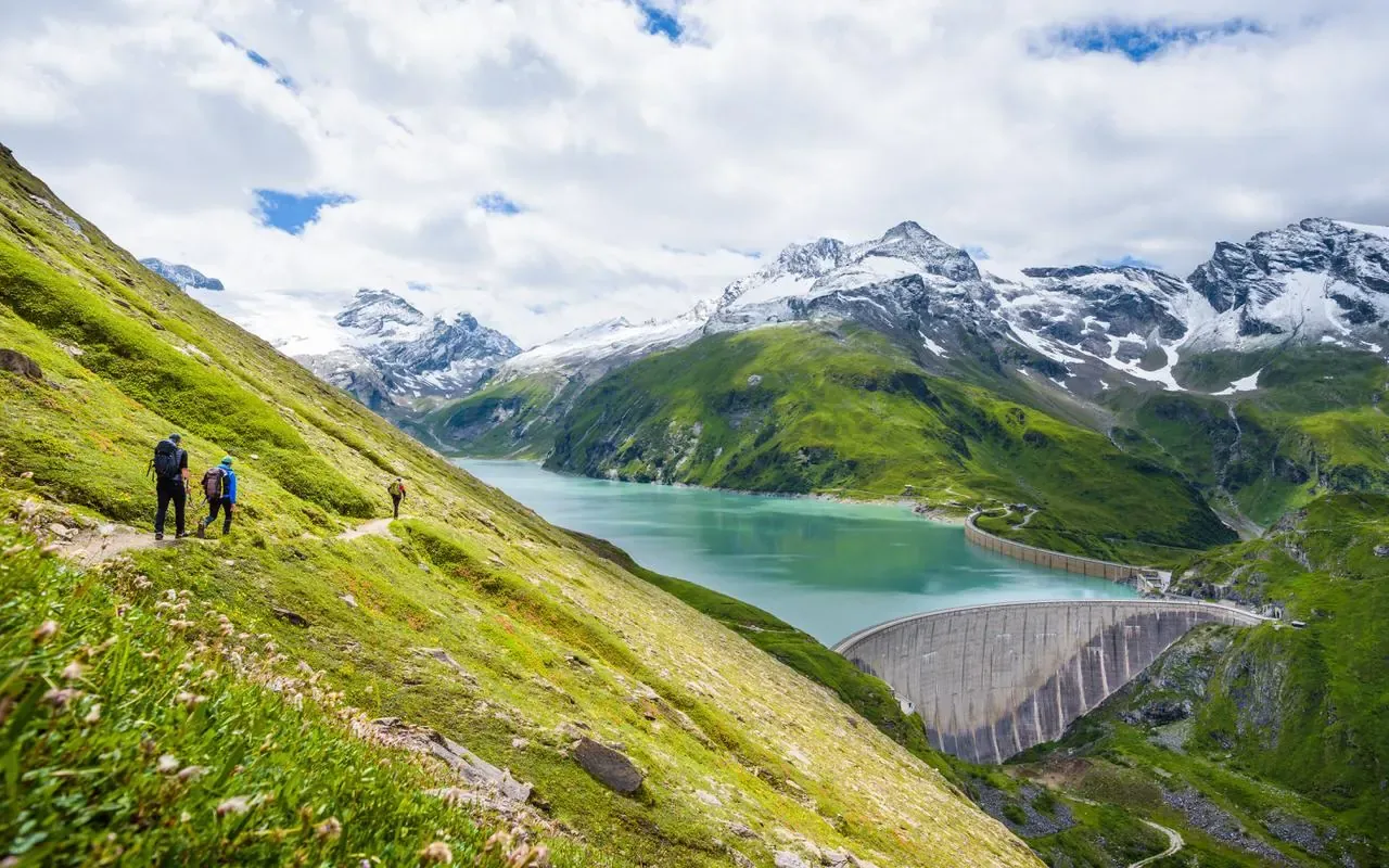 kaprun valley lake and dams hiking people