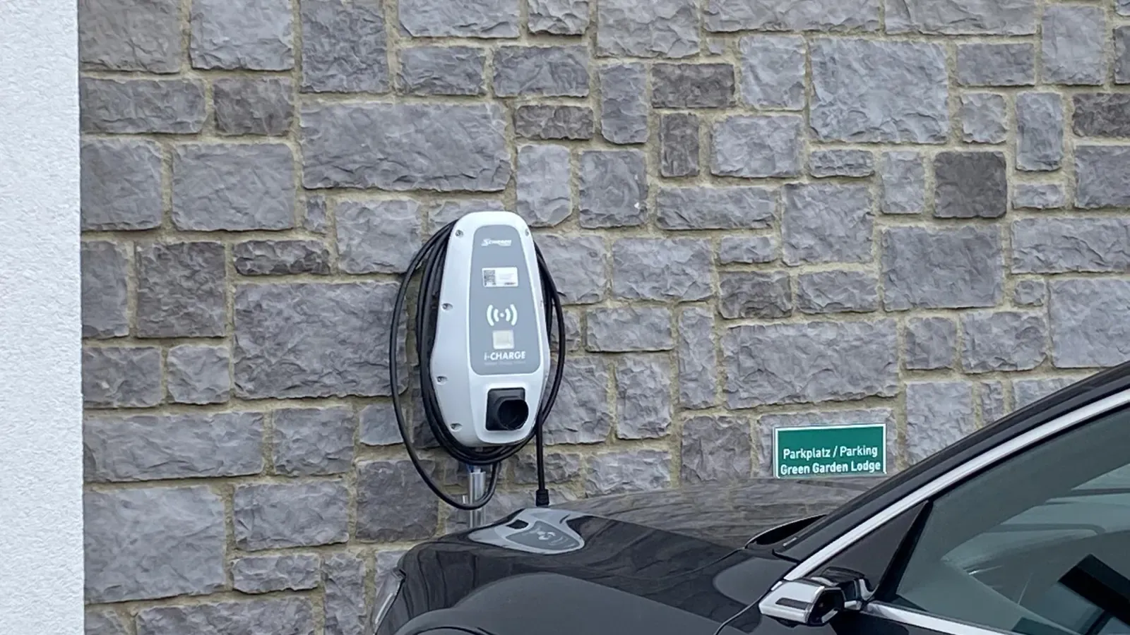 Electric car charging point at the chalet